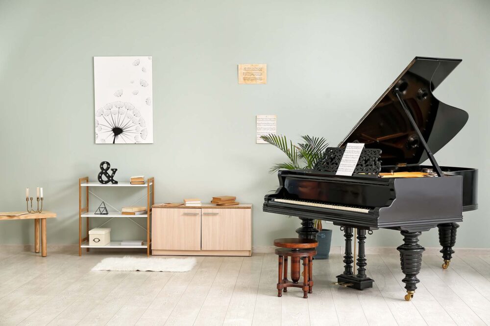A grand piano in a spacious living room